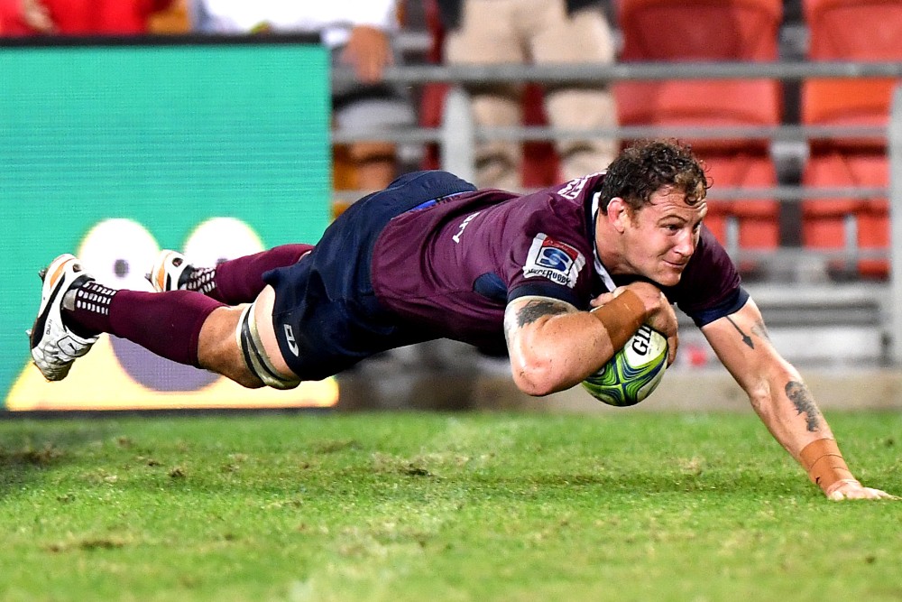 Scott Higginbotham races over for the winning try. Photo: Getty Images