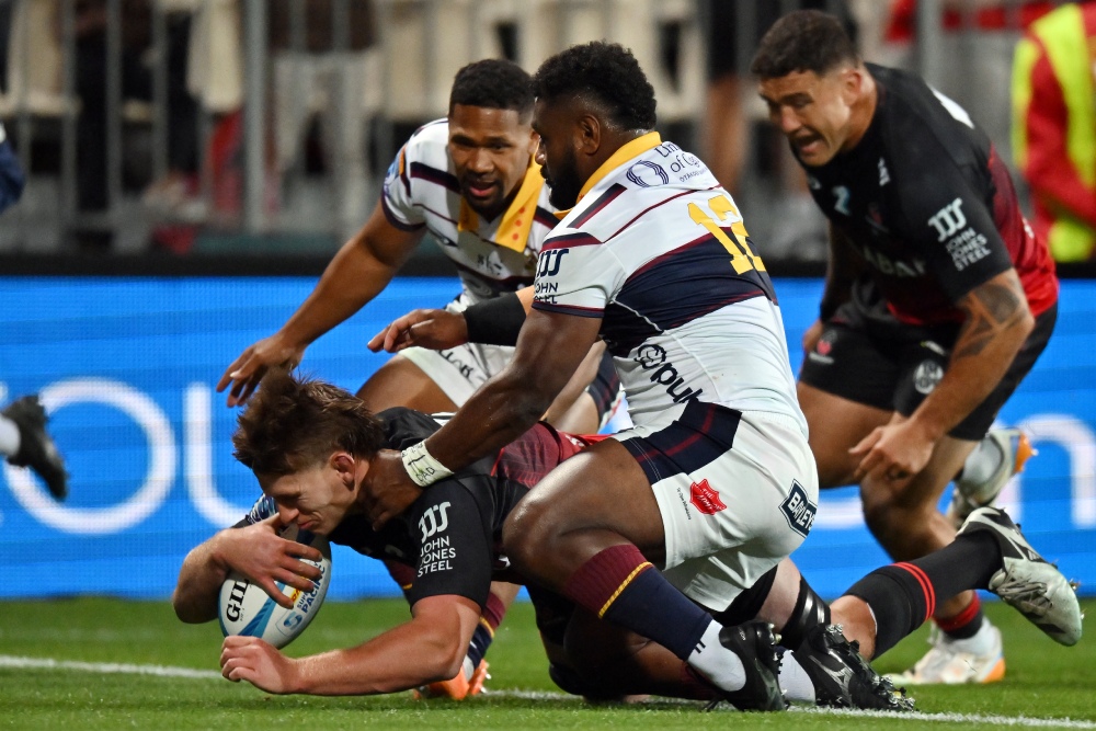 Crusaders player celebrating a try