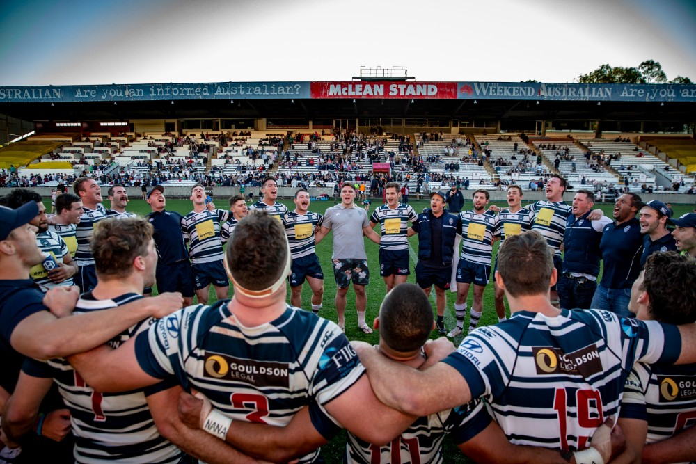 Brothers celebrate booking a place in the Queensland Premier Rugby grand final. Photo: QRU Media/Brendan Hertel