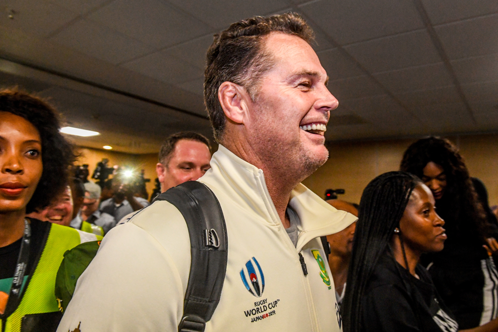 Rassie Erasmus was all smiles as his team arrived home from the Rugby World Cup. Photo: Getty Images