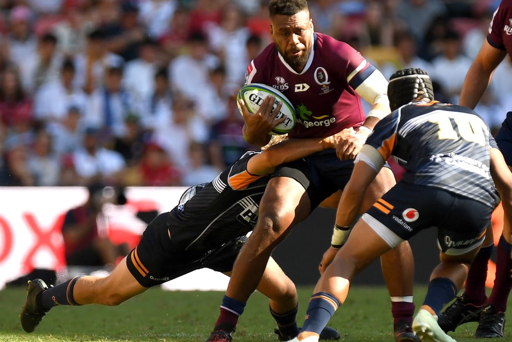 Samu Kerevi of the Reds takes on the defence during the round six Super Rugby match between the Reds and the Brumbies at Suncorp Stadium on March 24, 2019 in Brisbane, Australia. (Photo by Bradley Kanaris/Getty Images)