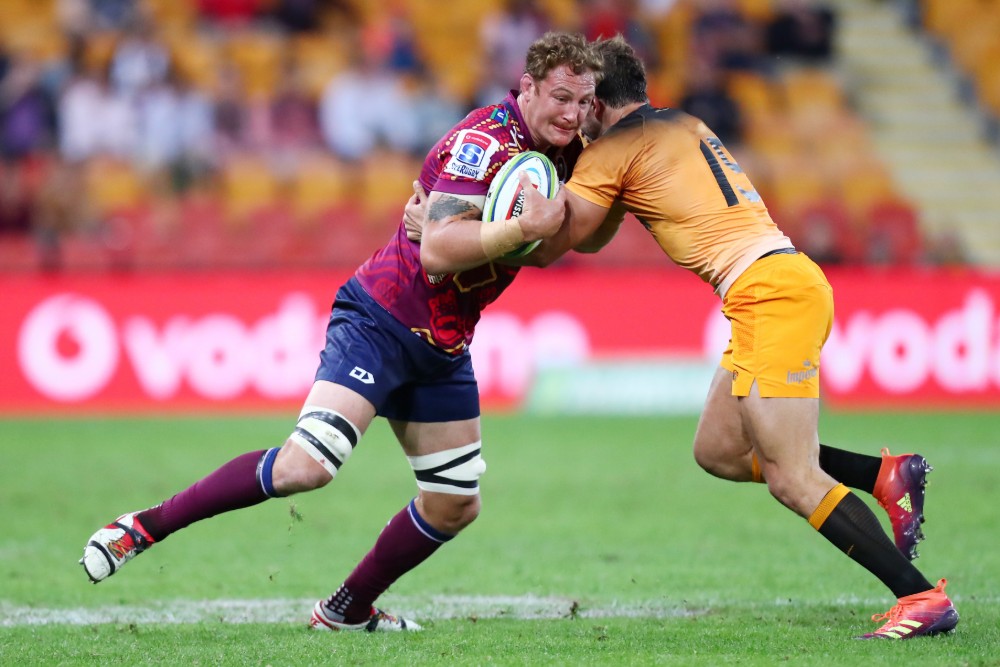 Scott Higginbotham on the charge in his 100th game for the Reds. Photo: Getty Images