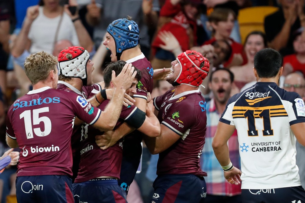Reds celebrate a Josh Flook try during their win over the Brumbies. Photo: Getty Images