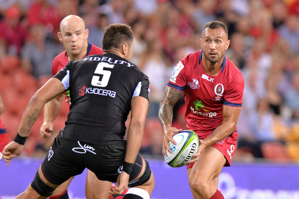 Quade Cooper and the Reds backs coughed up ball all game. Photo: Getty Images