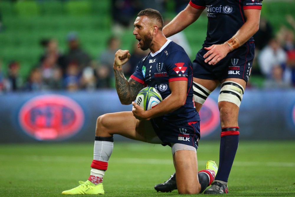 Quade Cooper celebrates scoring a try in the Rebels' win against the Sunwolves. Photo: Getty Images