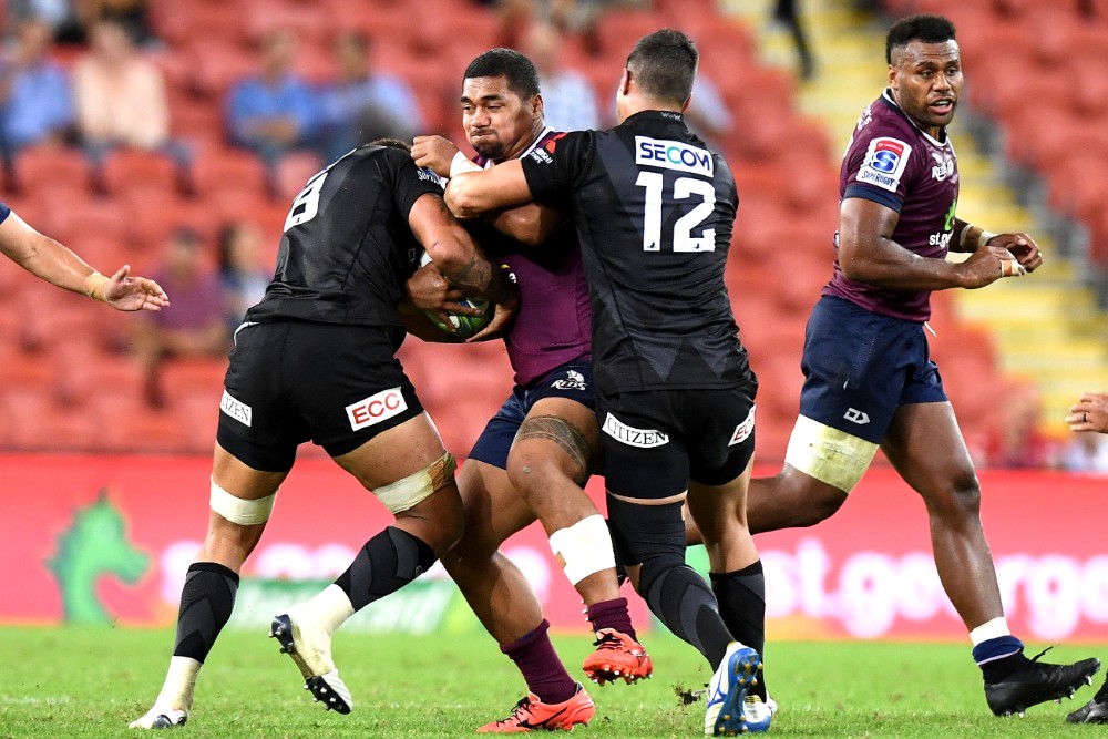 Chris Feauai-Sautia (with ball) has partnered magnificently with Samu Kerevi (right) in the centres this season. Photo: Getty Images