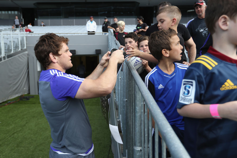 Matt Todd signing autographs at Eden Park on Friday. Photo: Getty Images