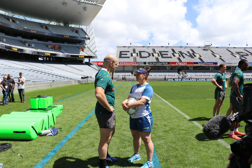 Wallabies skipper Stephen Moore chats to Wallaroos lineout thrower Louise Burrows. Photo: ARU Media