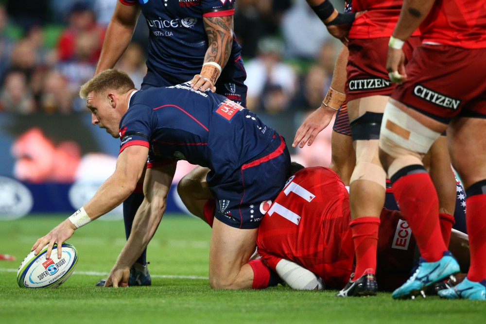 Rebels fullback Reece Hodge scores one of his two tries in the first half against the Sunwolves. Photo: Getty Images