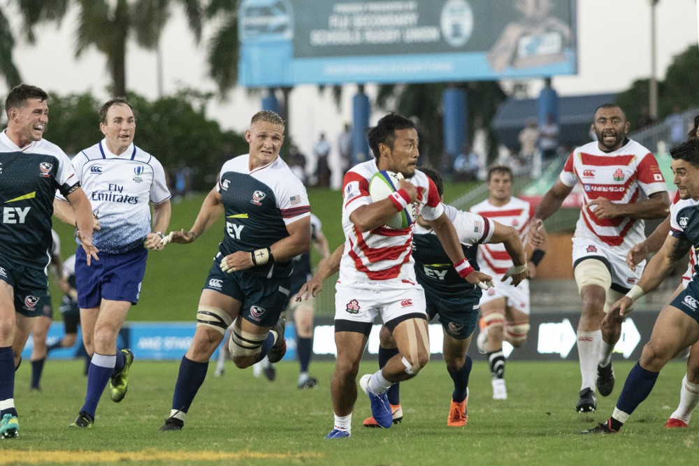 Japan's Yutaka Nagare runs the ball strongly in the Pacific Nations Cup final against the US. Photo: AFP