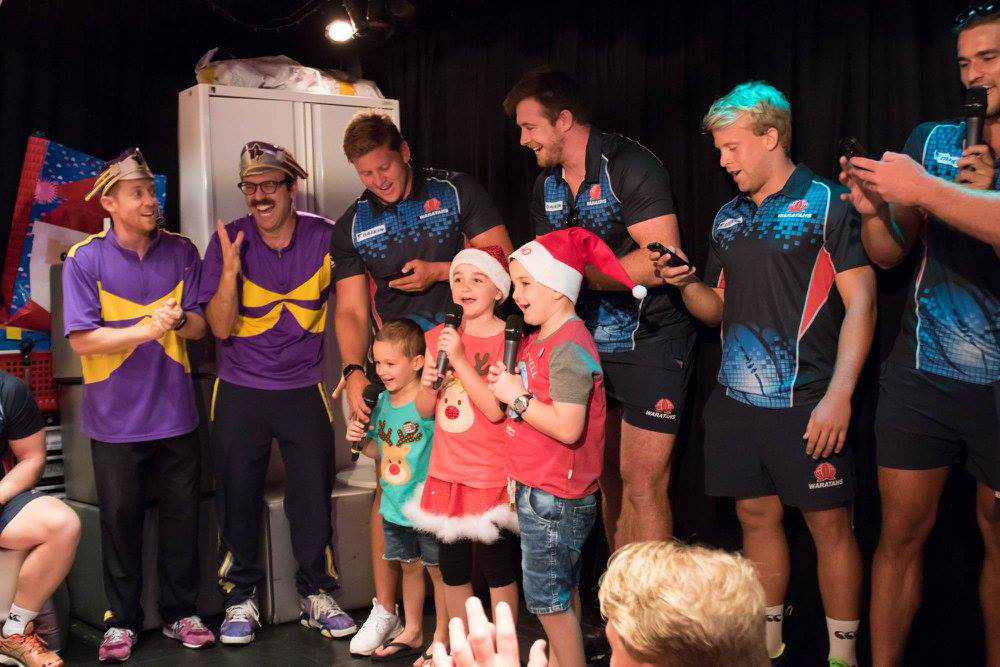 The Waratahs joined in some Christmas singing. Photo: Waratahs media