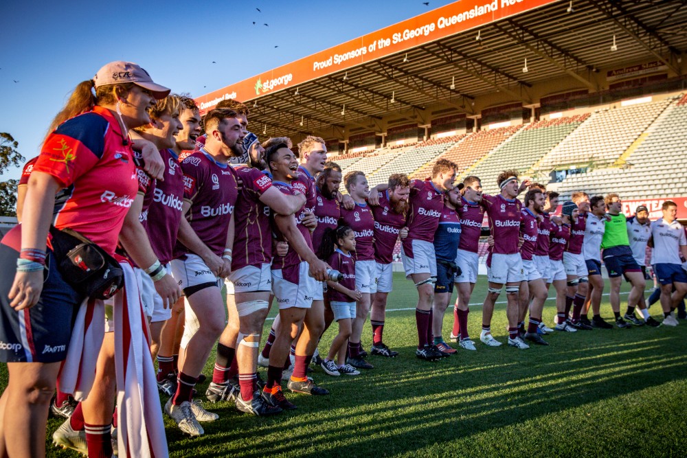 UQ celebrate sealing a spot in Saturday's QPR grand final against Brothers. Photo: QRU Media/Brendan Hertel